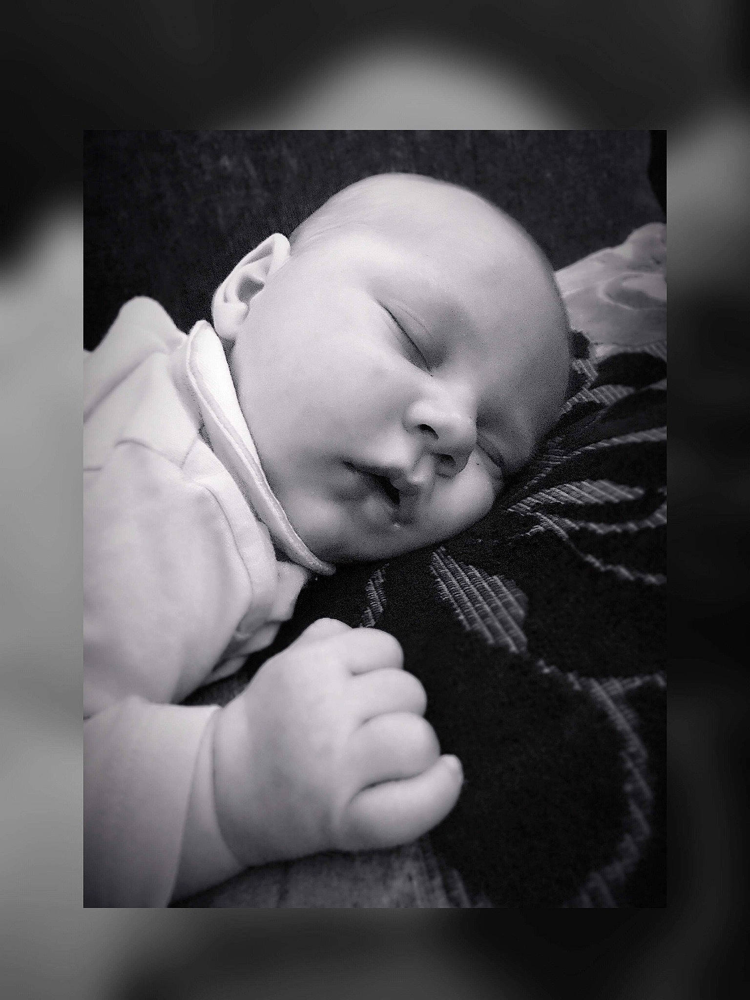 Kaylem is registered to the contest to win money with this photo: baby, black, black_and_white, cheek, child, cloud, eye, face, monochrome, monochrome_photography, nose, person, photograph, photography, portrait_photography, skin, sky, sleep, snapshot, toddler