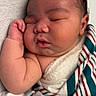 Phoenix is registered to the contest to win money with this photo: newborn, baby, sleeping, blanket, hospital, infant, cute, peaceful, wrapped, soft, face, hand, skin, portrait, resting, cozy, child, closeup, fresh, toddler