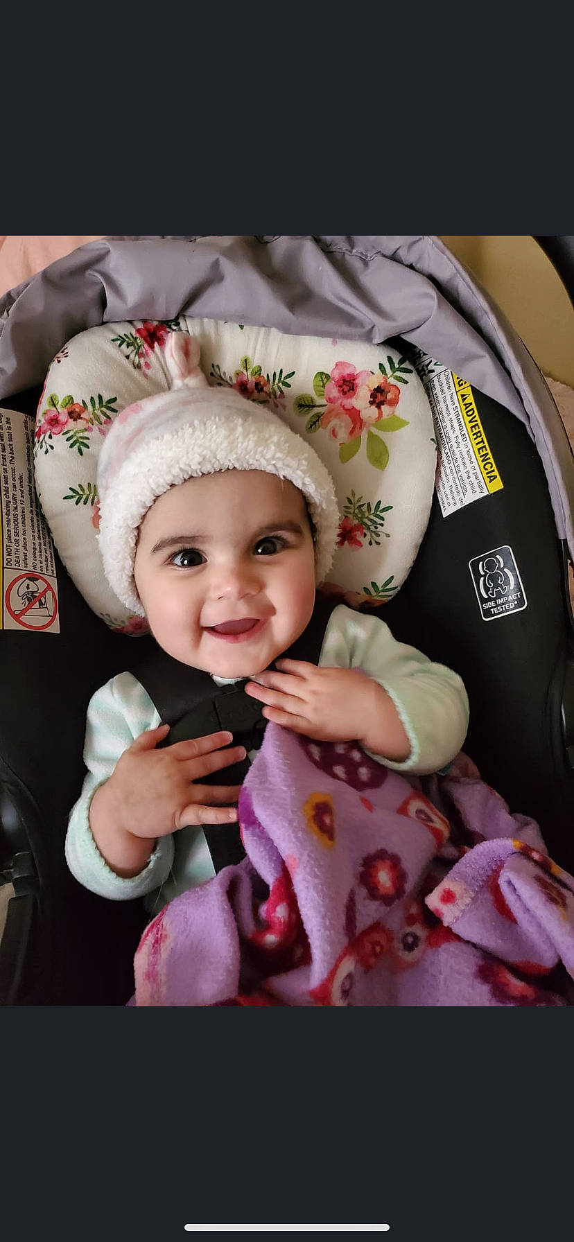 Brinleigh is registered to the contest to win money with this photo: baby, car_seat, cheek, child, headgear, headwear, joy, person, smile, toddler