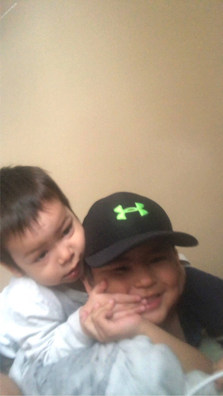 Isaiah is registered to the contest to win money with this photo: baseball_cap, cap, cheek, chin, comfort, facial_expression, forehead, fun, gesture, happy, hat, headgear, headwear, interaction, joy, mammal, mouth, nose, person, skin