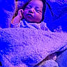 baby, sleeping, blanket, blue_light, cozy, infant, soft_texture, wrapped, cute, face, peaceful, child, indoors, resting, warm, plush, clothing, portrait, newborn, comfort