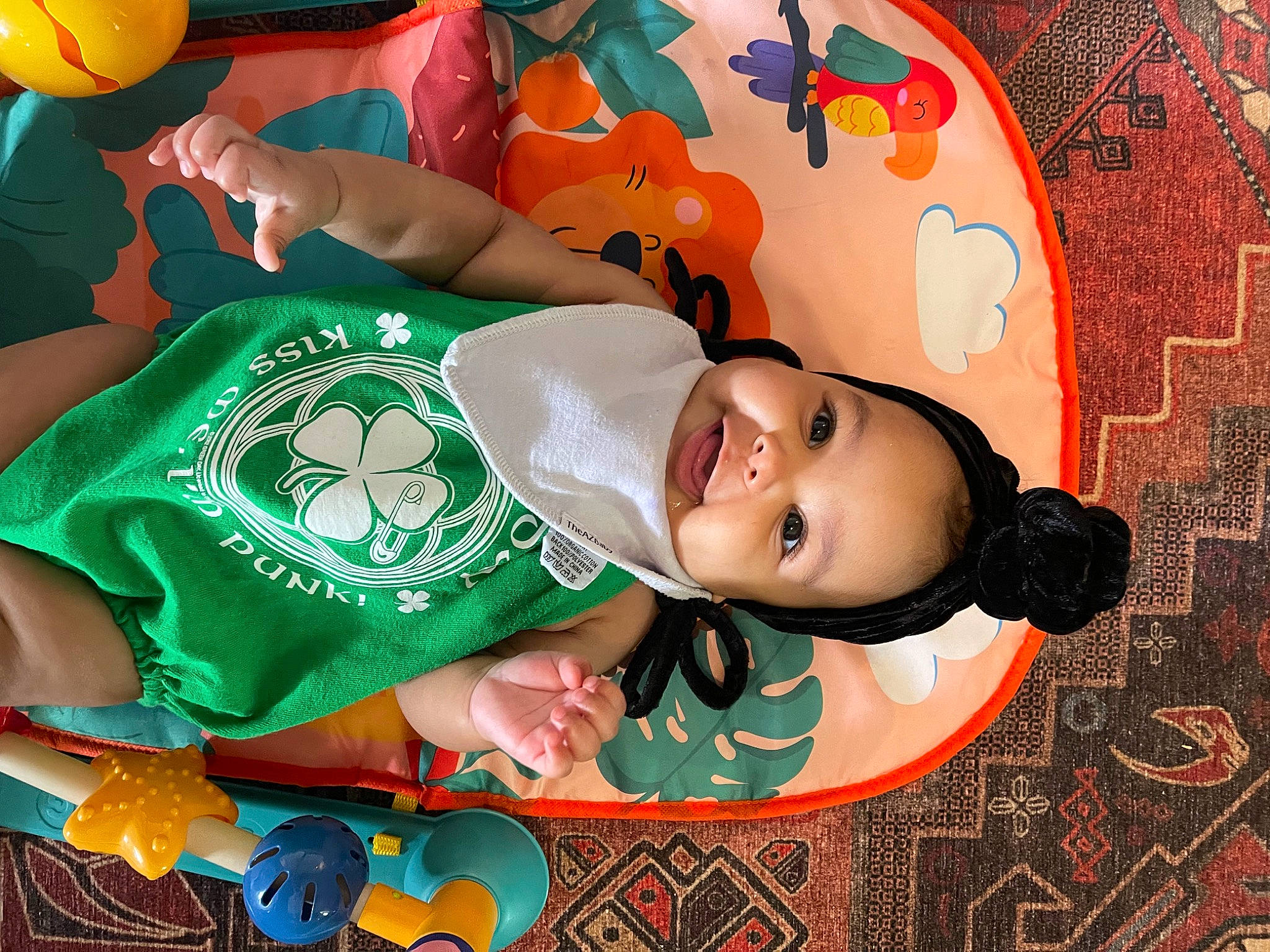 Violet is registered to the contest to win money with this photo: art, ball, child, flooring, fun, green, happy, linens, logo, pattern, person, sleeve, smile, sportswear, visual_arts, yellow