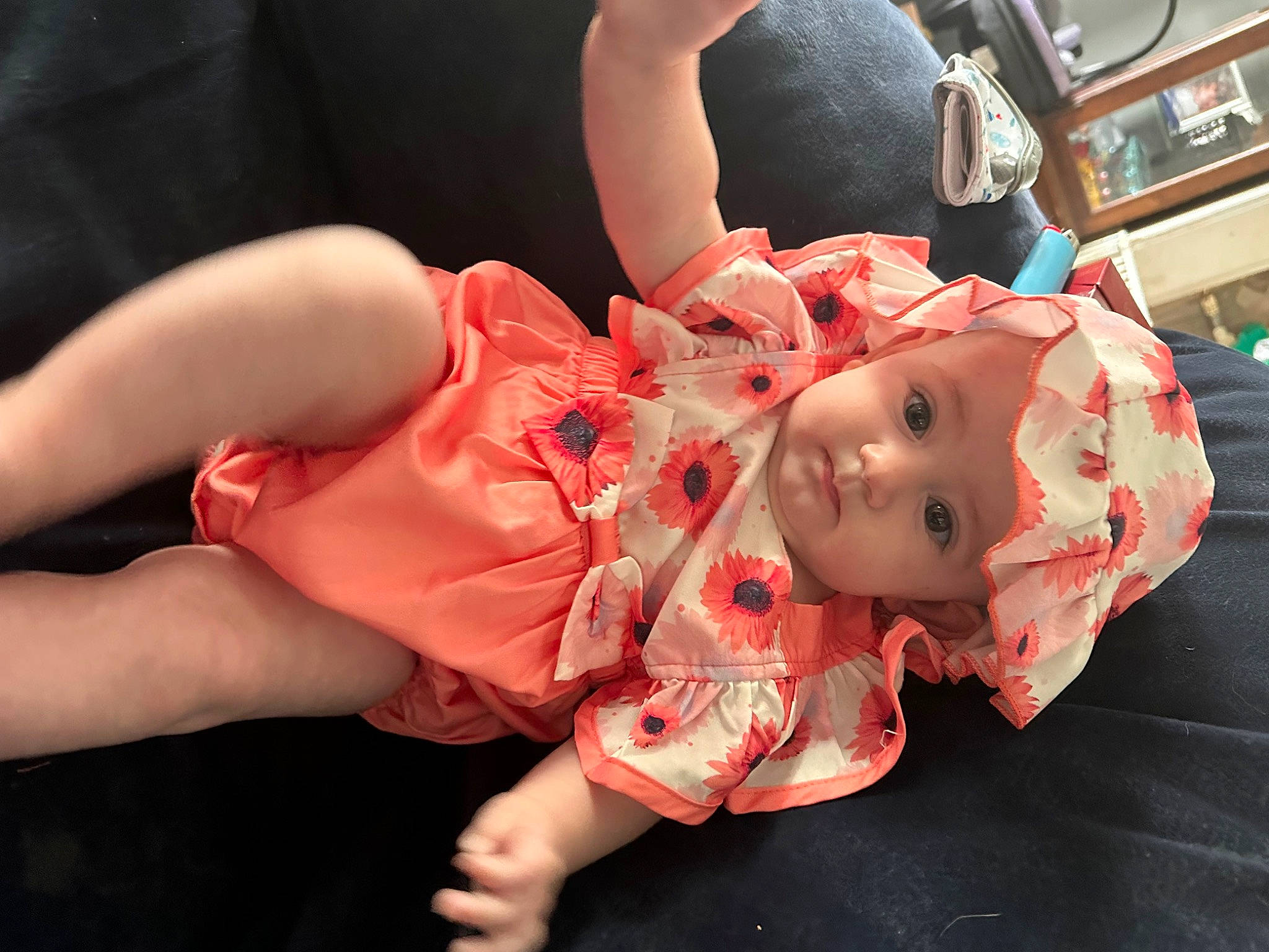 Adelaide is registered to the contest to win money with this photo: abdomen, baby, baby_toddler_clothing, carmine, cheek, child, costume, event, flesh, fun, hat, headwear, human_leg, knee, mouth, person, sitting, thigh, toddler