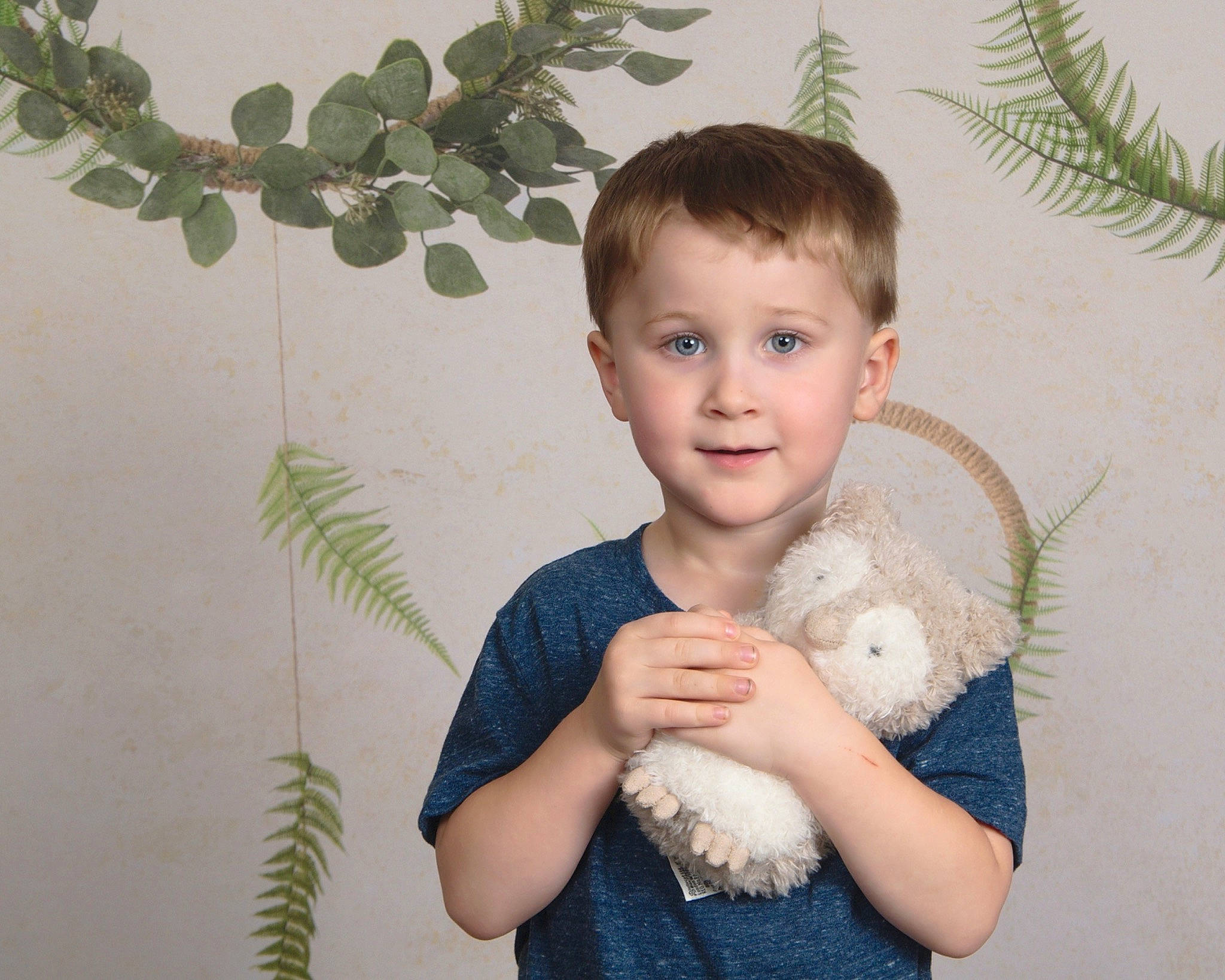 Jackson is registered to the contest to win money with this photo: baby_toddler_clothing, botany, child, eye, finger, gesture, grass, hand, happy, head, insect, leaf, organ, organism, person, plant, skin, sleeve, smile, standing