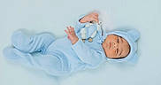 Shaurya joined the competition — help win amazing prizes! baby, blue_onesie, child, clothing, cozy, cute, face, hand, head, hood, indoor, infant, lying_down, newborn, peaceful, portrait, skin, sleepwear, soft_background, stuffed_animal