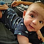 Landen joined the competition — help win amazing prizes! ankle, arm, baby, bodypart, clothing, couch, crawling, face, finger, furniture, hand, happy, head, newborn, pants, person, photography, portrait, smile, t_shirt