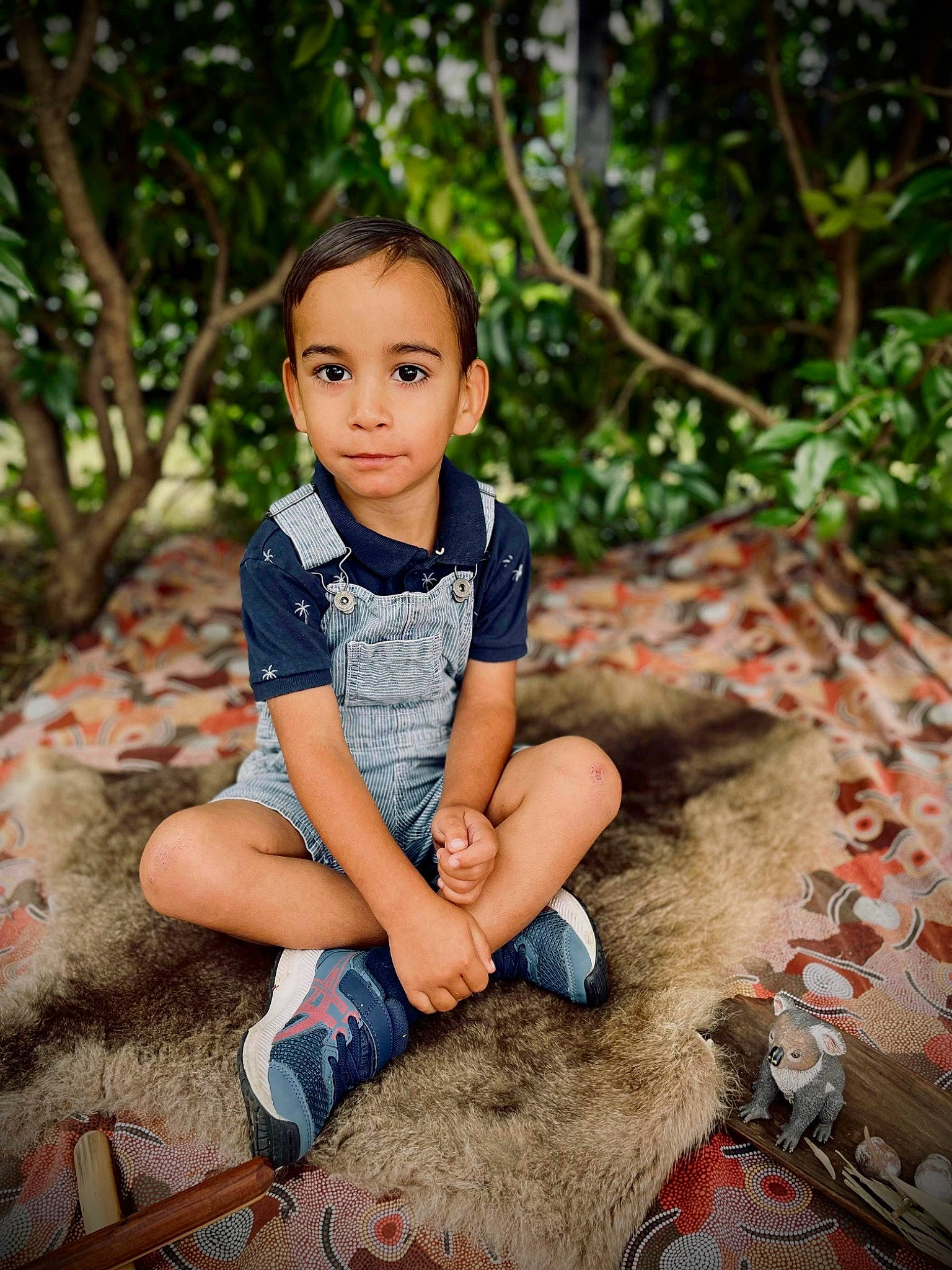 Kurtlee is registered to the contest to win money with this photo: baby_toddler_clothing, beauty, child, eye, flash_photography, foot, fun, grass, happy, head, leg, leisure, person, plant, shorts, skin, sneakers, thigh, toddler, tree