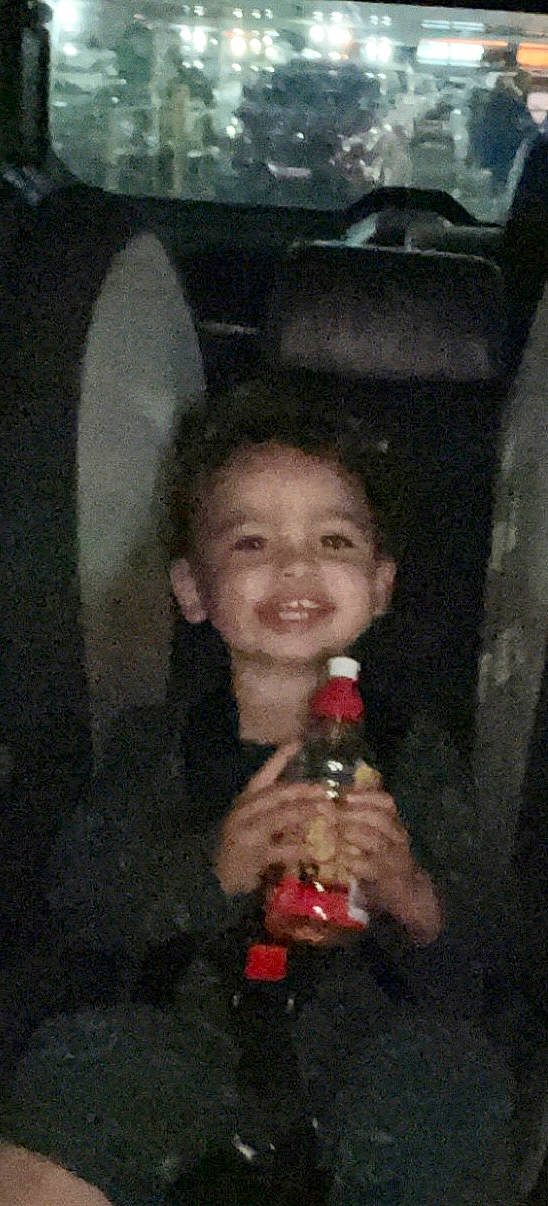 Darrell joined the competition — help win amazing prizes! beer, bottle, cheek, child, darkness, drink, drinking, drinkware, flash_photography, fun, glass, glass_bottle, happy, human_body, joy, nail, nose, person, plastic_bottle, smile