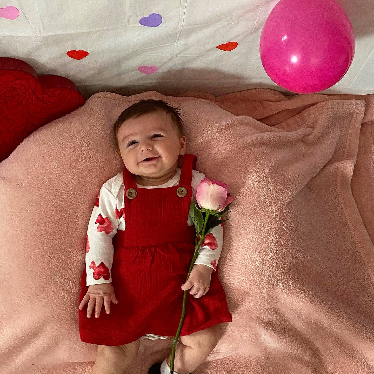 Delilah joined the competition — help win amazing prizes! baby, baby_toddler_clothing, balloon, beauty, comfort, event, facial_expression, flower, happy, joy, magenta, party_supply, person, petal, pink, rose, sleeve, smile, textile, toddler