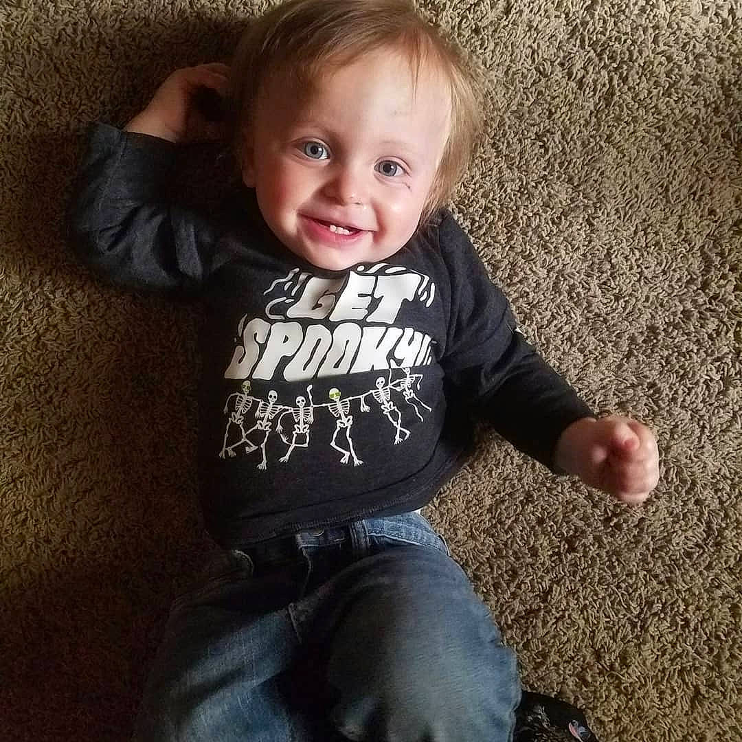 Sebastian is registered to the contest to win money with this photo: baby, cheek, child, cool, eye, face, hand, head, jeans, joy, leg, nose, person, photography, play, sitting, skin, sleeve, smile, standing