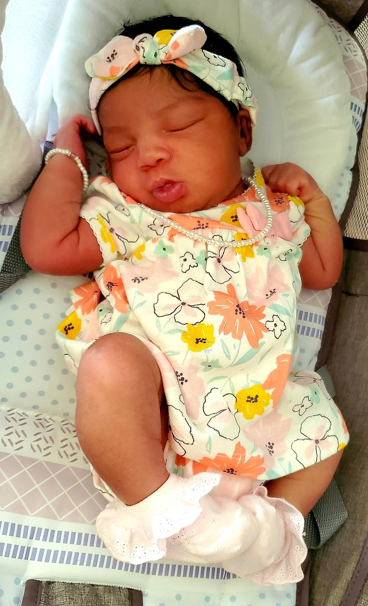 Ellie is registered to the contest to win money with this photo: baby, baby_toddler_clothing, cheek, comfort, face, facial_expression, finger, glasses, goggles, headgear, headwear, lip, mouth, person, pink, skin, sleeve, sunglasses, textile, toddler