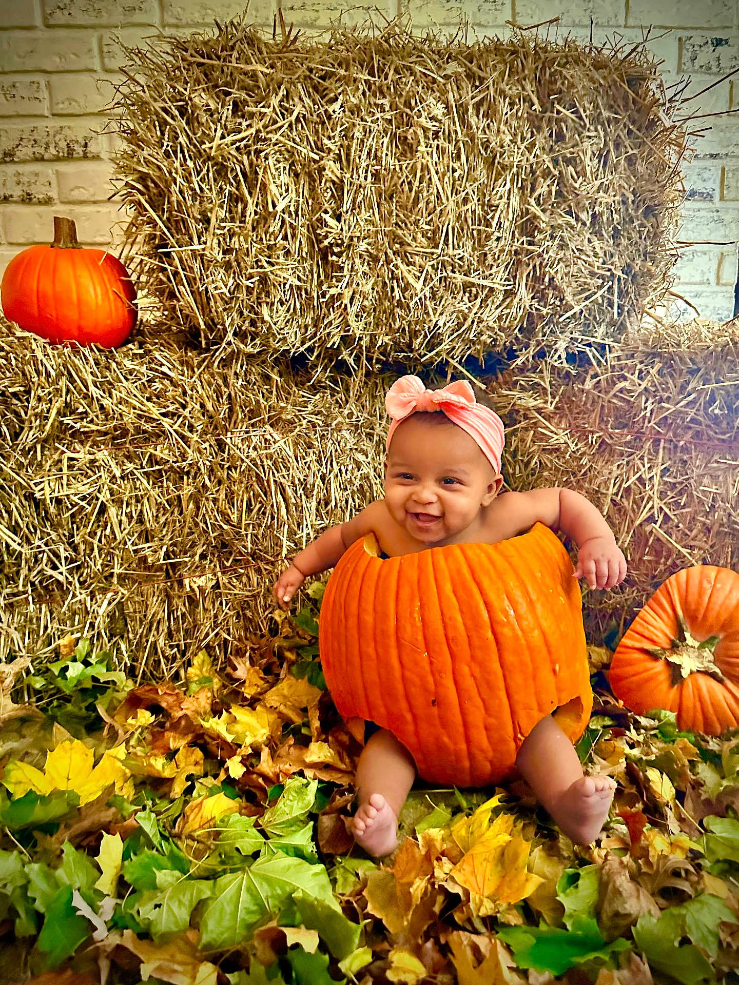 Uriella joined the competition — help win amazing prizes! baby, clothing, countryside, face, food, hat, head, leaf, nature, outdoors, person, photography, plant, portrait, produce, pumpkin, soil, squash, straw, vegetable