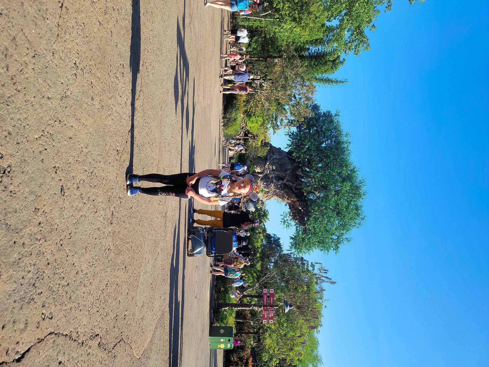 Skylar is registered to the contest to win money with this photo: adventure, azure, blue, concrete, daytime, electrical_supply, facade, fun, headwear, joy, landscape, leisure, person, plant, pole, recreation, shadow, sky, sport_climbing, street_light