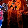 Karsen is registered to the contest to win money with this photo: child, costume, pumpkin_head, scarecrow, jack_o_lantern, halloween, smiling, hat, blue_pants, red_shirt, spooky, illustration, skull, witch, doll_face, orange, coat, dark_background, holiday, fun