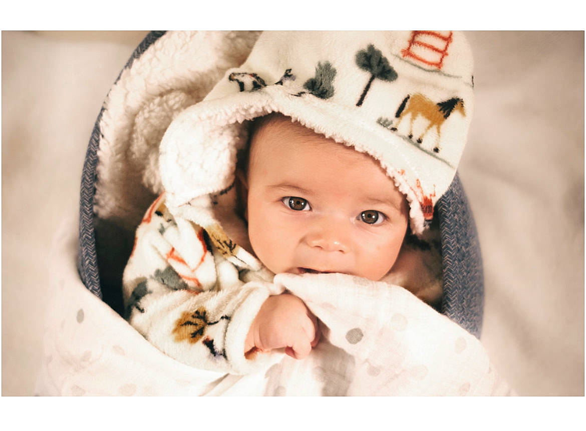 Theo is registered to the contest to win money with this photo: baby, baby_sleeping, baby_toddler_clothing, beanie, cap, cheek, child, comfort, eyelash, fashion_accessory, flash_photography, fur, happy, headwear, knit_cap, linens, person, portrait_photography, sleeve, stock_photography