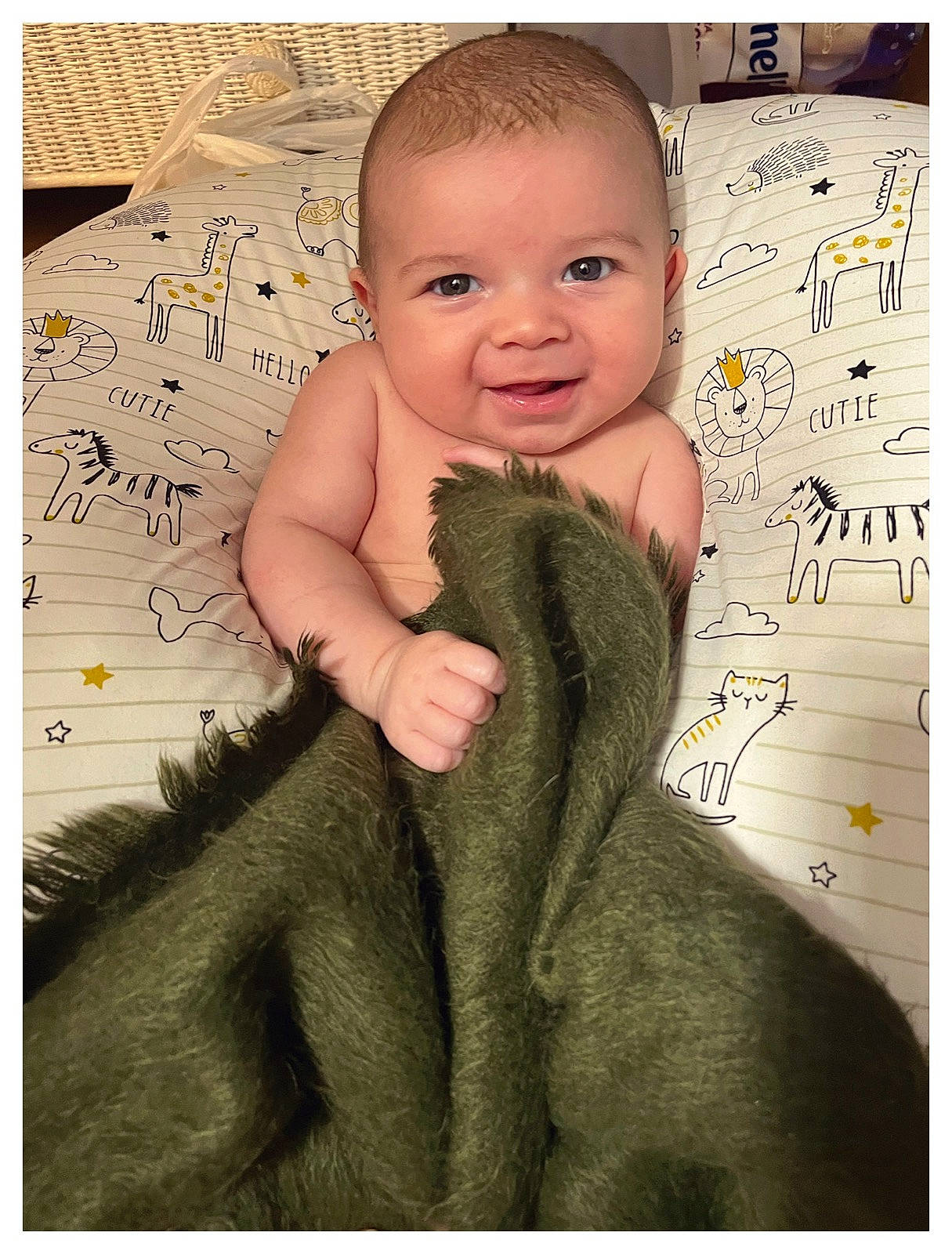 Theo joined the competition — help win amazing prizes! baby, baby_toddler_clothing, cheek, child, comfort, eyelash, finger, font, gesture, happy, nail, pattern, person, photo_caption, sitting, skin, sleeve, smile, stock_photography, thumb