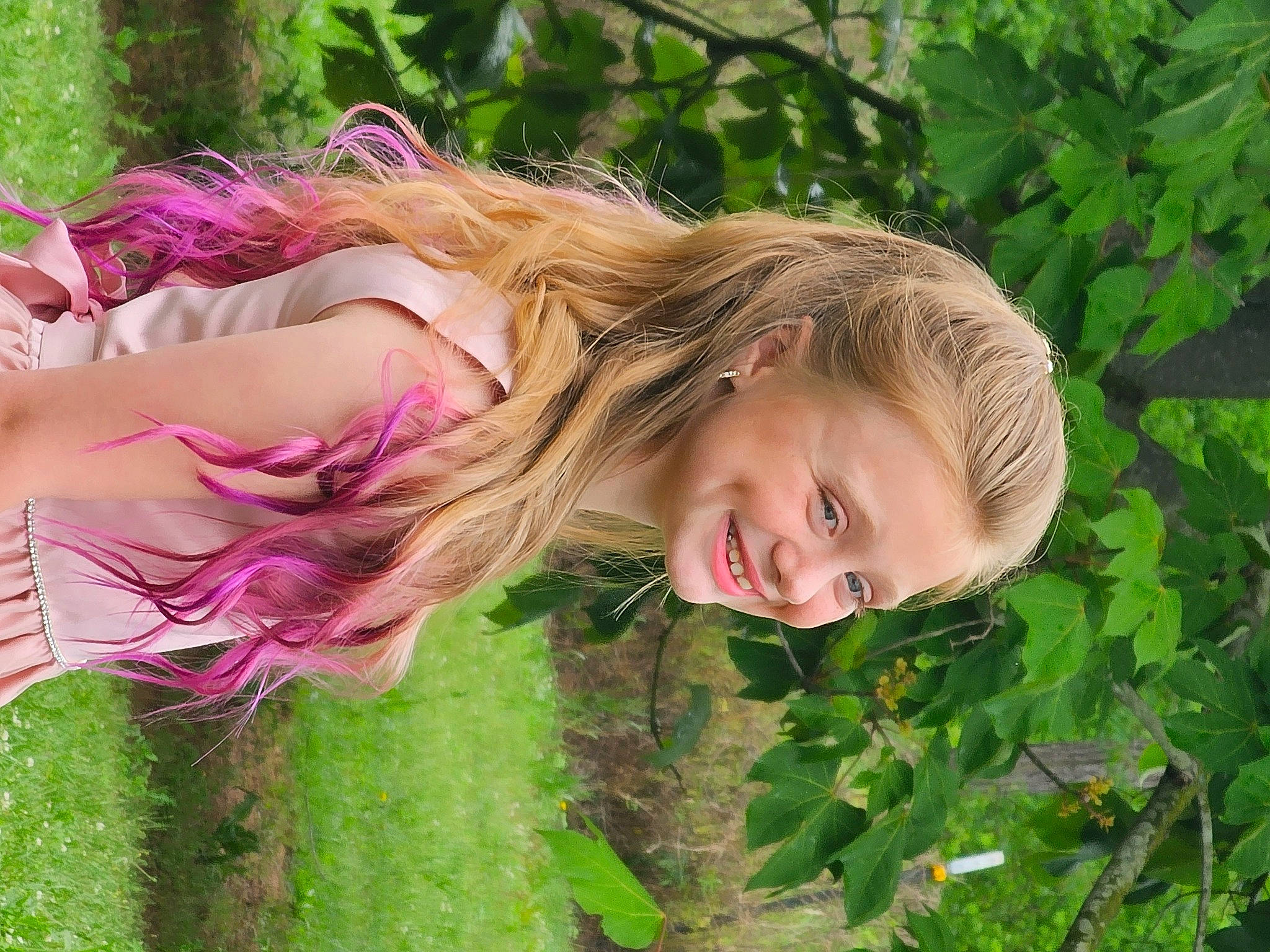 Lillianna is registered to the contest to win money with this photo: blond, brown_hair, child, feathered_hair, flower, flowering_plant, fun, grass, grassland, happy, joy, leaf, leisure, magenta, people_in_nature, person, plant, portrait_photography, smile, spring