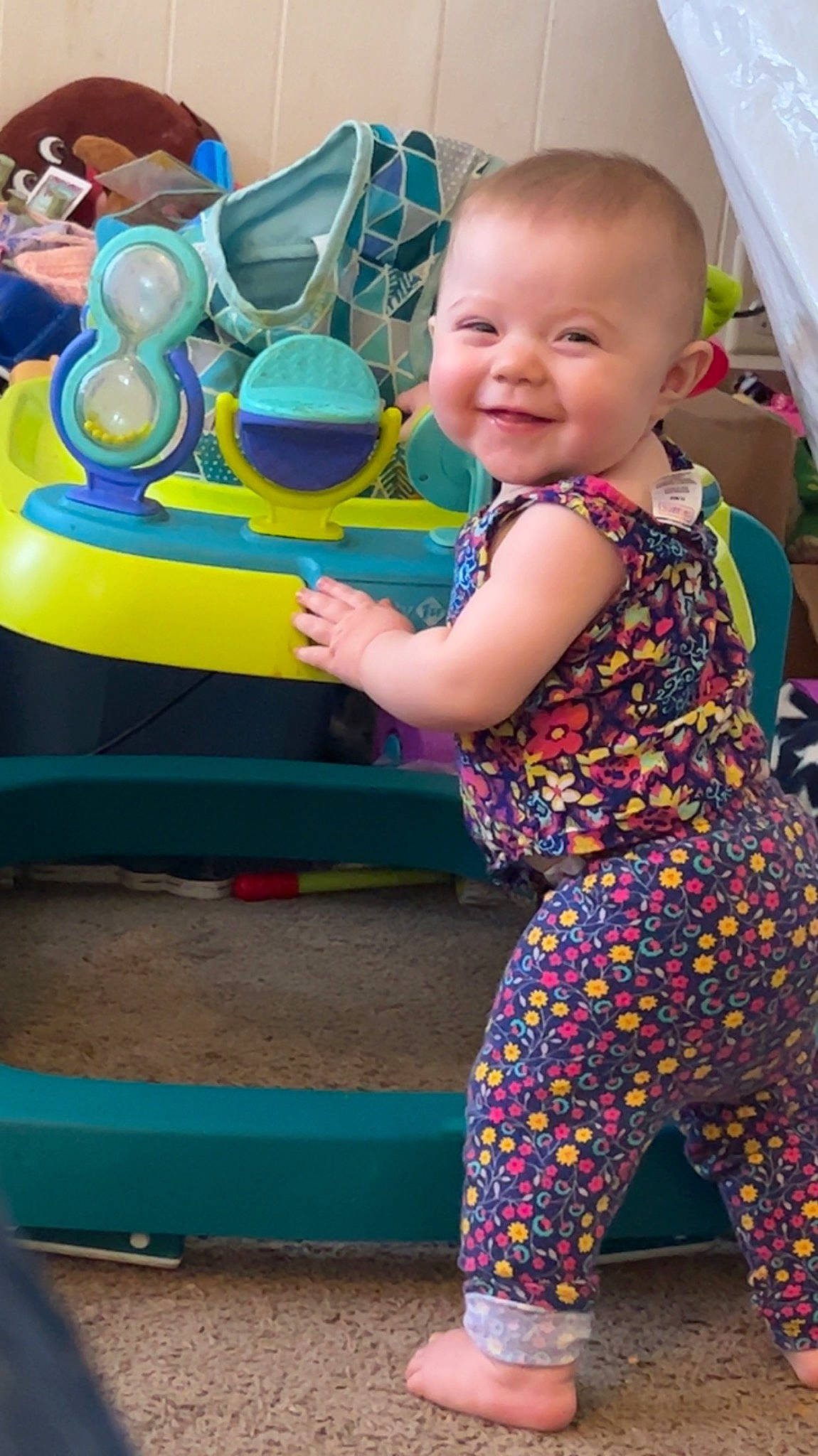 Esme is registered to the contest to win money with this photo: baby, baby_toddler_clothing, blue, child, facial_expression, fun, green, happy, head, human_settlement, joy, leisure, person, photograph, product, skin, sleeve, smile, snapshot, summer