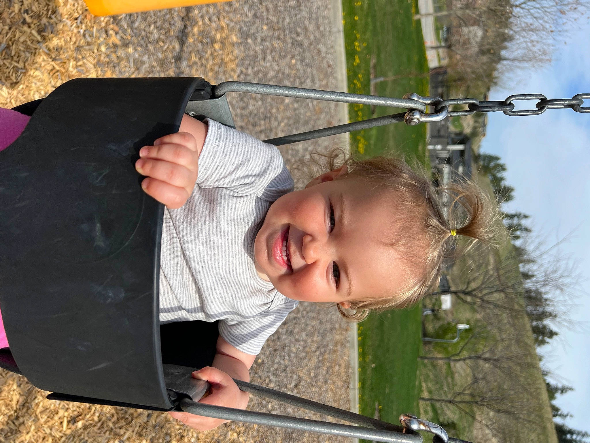 Olivia is registered to the contest to win money with this photo: baby, child, fun, grass, hairstyle, happy, joy, leisure, mammal, people_in_nature, person, photograph, plant, recreation, sky, smile, snapshot, toddler, tree, vacation