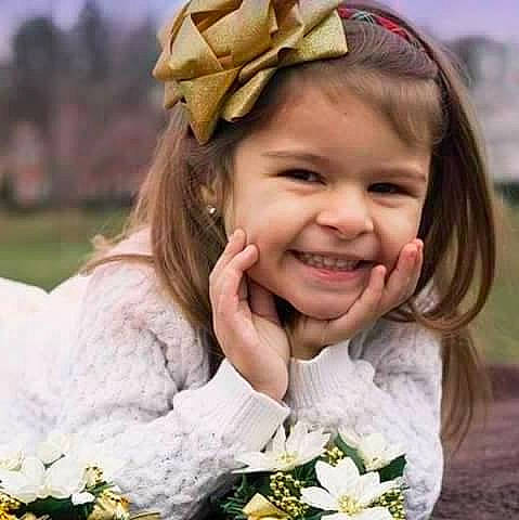 Aleena joined the competition — help win amazing prizes! brown_hair, child, child_model, facial_expression, fashion_accessory, flower, flower_girl, hair, hair_accessory, hairstyle, happy, headband, headgear, headpiece, joy, laugh, person, petal, plant, skin