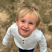 Lukas joined the competition — help win amazing prizes! blonde_hair, blue_eyes, boy, casual, casual_clothing, child, cute, daylight, face, grass, happy, looking_up, nature, outdoor, person, portrait, smiling, standing, white_sweater, young