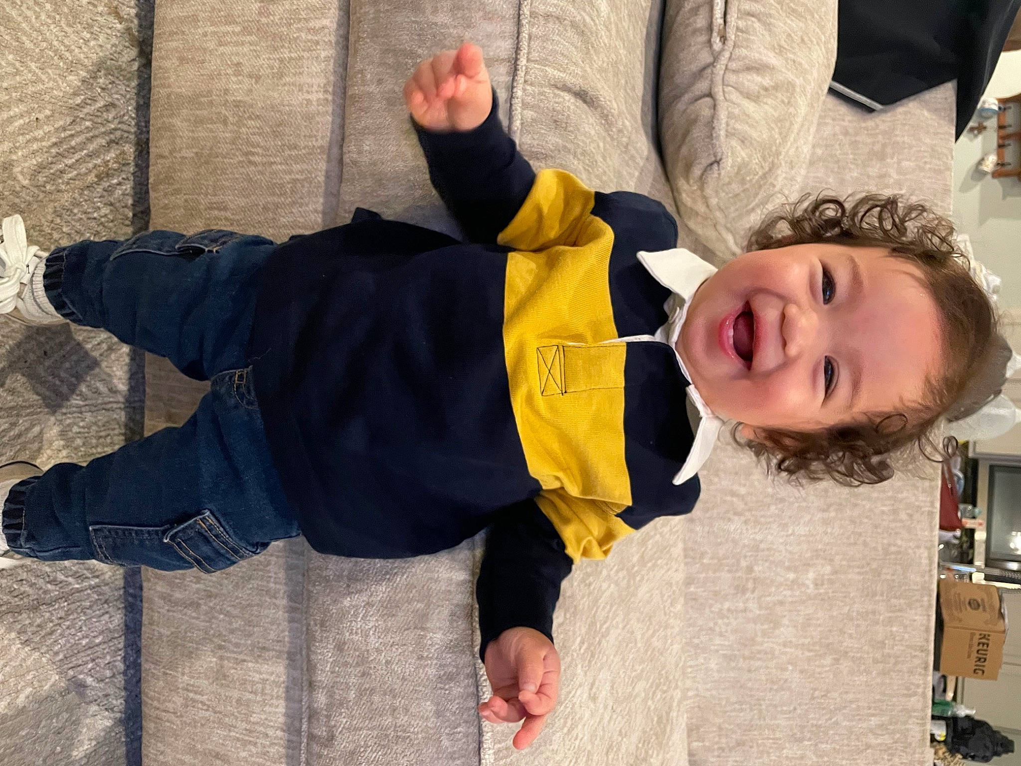 Anthony is registered to the contest to win money with this photo: baby, child, flooring, fun, happy, leisure, person, sitting, smile, toddler, tourism, tree, vacation, winter, wood