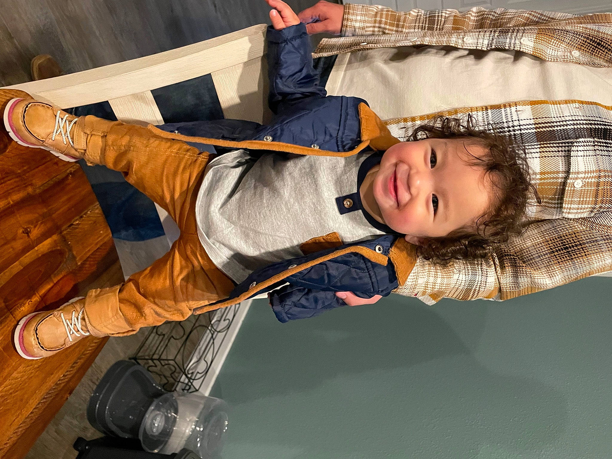 Anthony is registered to the contest to win money with this photo: event, flash_photography, fun, glove, happy, joy, leisure, performance, performing_arts, person, recreation, smile, thigh, toddler, tree