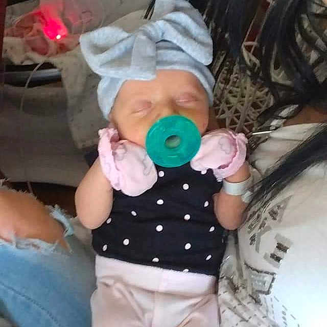 Alanah joined the competition — help win amazing prizes! baby, baby_toddler_clothing, child, clothing, comfort, finger, fun, happy, joint, knee, pattern, pink, sitting, sleeve, stuffed_toy, t_shirt, thigh, thumb, toddler, white