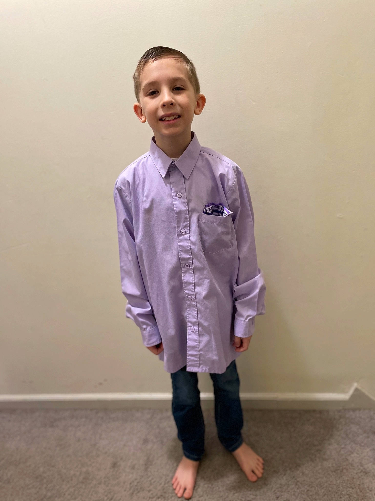 Cade is registered to the contest to win money with this photo: arm, baby_toddler_clothing, blazer, button, collar, dress_shirt, face, fashion_design, formal_wear, gesture, happy, head, human_body, joy, neck, person, school_uniform, shoulder, sleeve, smile