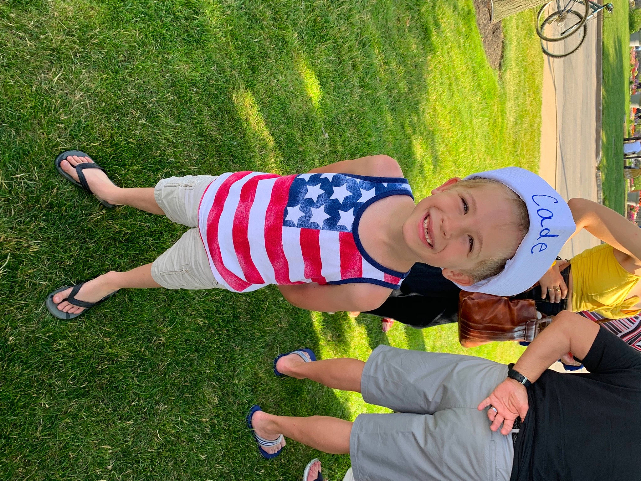 Cade joined the competition — help win amazing prizes! baby, baby_toddler_clothing, electric_blue, event, flag_of_the_united_states, fun, grass, happy, hat, joy, knee, lap, lawn, leisure, people_in_nature, person, recreation, shorts, t_shirt, thigh