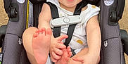 Remington joined the competition — help win amazing prizes! baby, car_seat, smiling, child, outdoor, happy, infant, seatbelt, foot, hand, person, clothing, head, face, safety, playful, cute, skin, fabric, seat