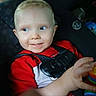 Justin joined the competition — help win amazing prizes! child, toddler, baby, smiling, portrait, car_seat, seatbelt, red_shirt, blond_hair, blue_eyes, vehicle, interior, adult_hand, toy, colorful_toy, sitting, face, closeup, happy,  안전