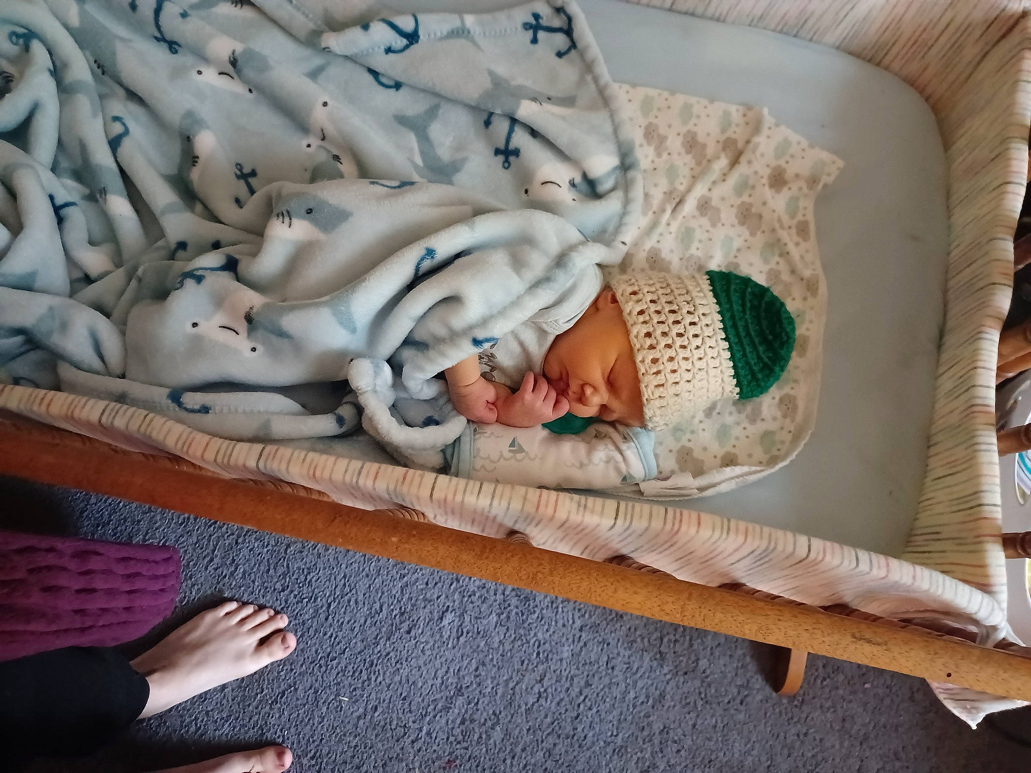 Edwin is registered to the contest to win money with this photo: baby, baby_products, baby_sleeping, baby_toddler_clothing, bedding, bedtime, comfort, couch, flooring, foot, hand, head, headwear, infant_bed, leg, linens, nap, pattern, person, textile