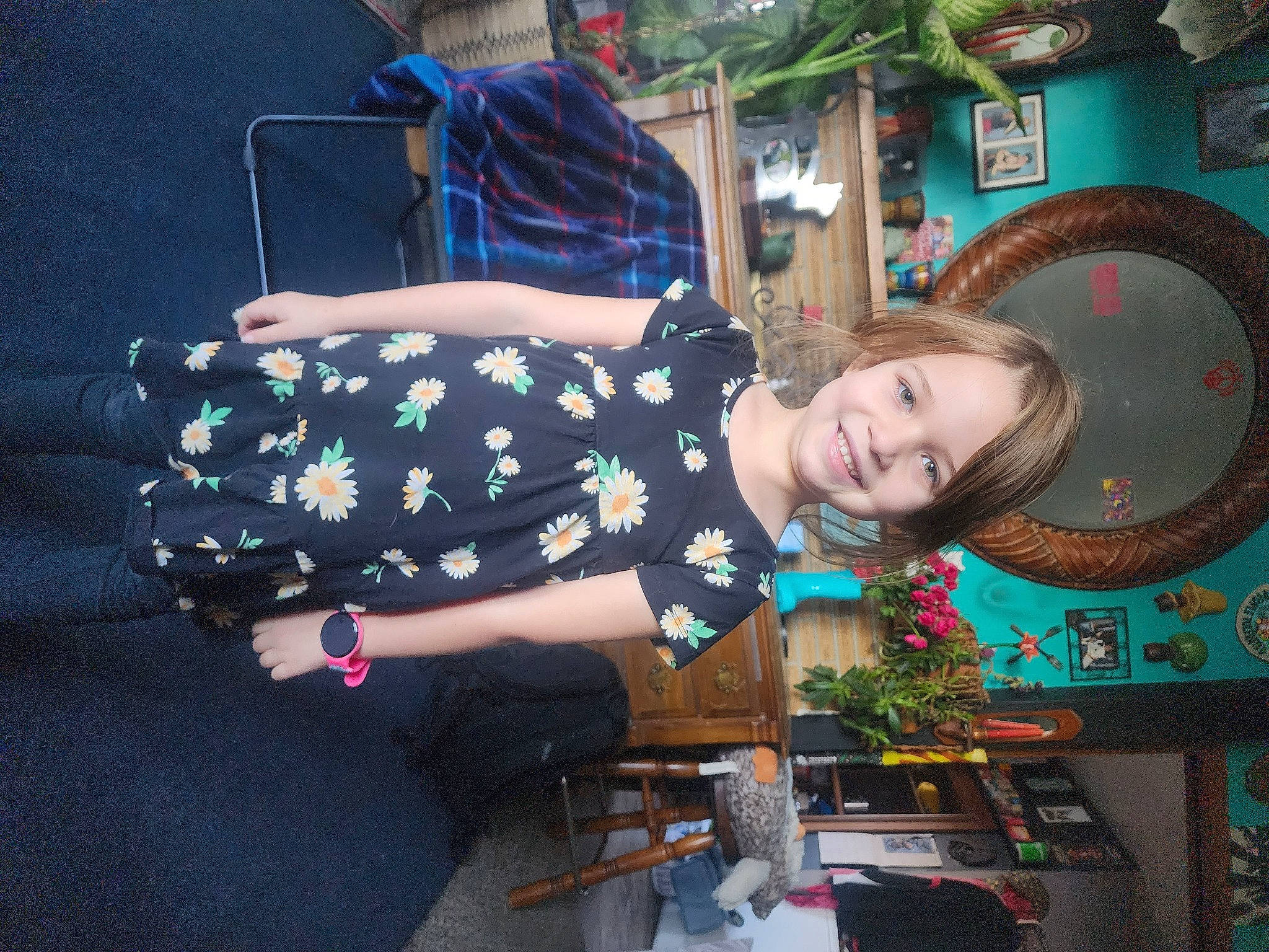 Dorothy is registered to the contest to win money with this photo: child, electric_blue, event, fashion_accessory, fun, happy, joy, leisure, pattern, person, recreation, sitting, smile, travel