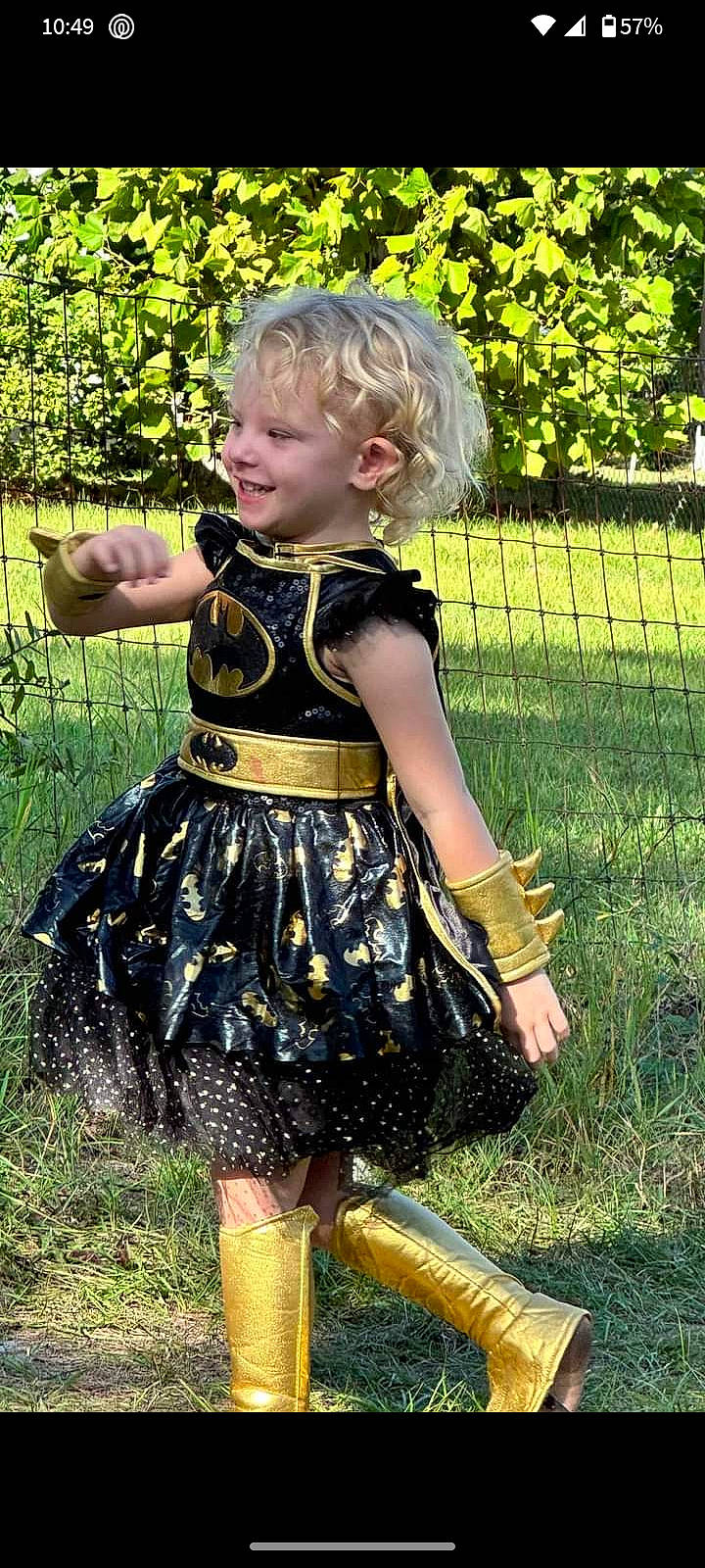 Adalyn joined the competition — help win amazing prizes! baby_toddler_clothing, child, dress, eye, fence, fun, grass, grass_family, hand, happy, joy, lawn, meadow, one_piece_garment, pattern, people_in_nature, person, plant, smile, summer