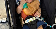 Elijah joined the competition — help win amazing prizes! baby, bib, child, clothing, cushion, cute, expression, fabric, foot, footwear, hand, head_support, indoor, infant, pacifier, person, seatbelt, sitting, stroller, toy