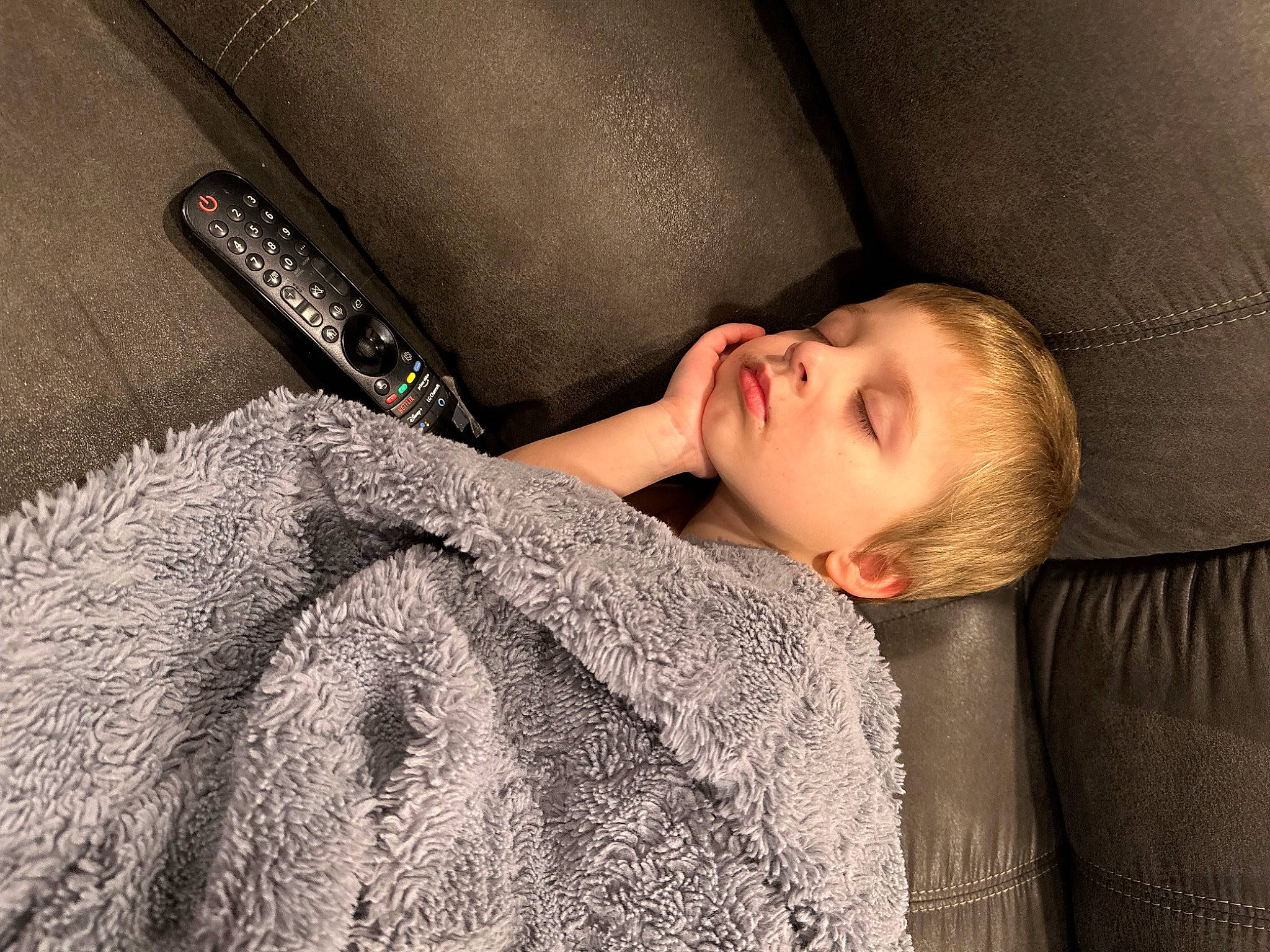 Jeremiah is registered to the contest to win money with this photo: baby, bedding, child, comfort, couch, flash_photography, flooring, fur, grey, linens, pattern, person, portrait_photography, room, skin, sleep, sleeve, textile, toddler, wood