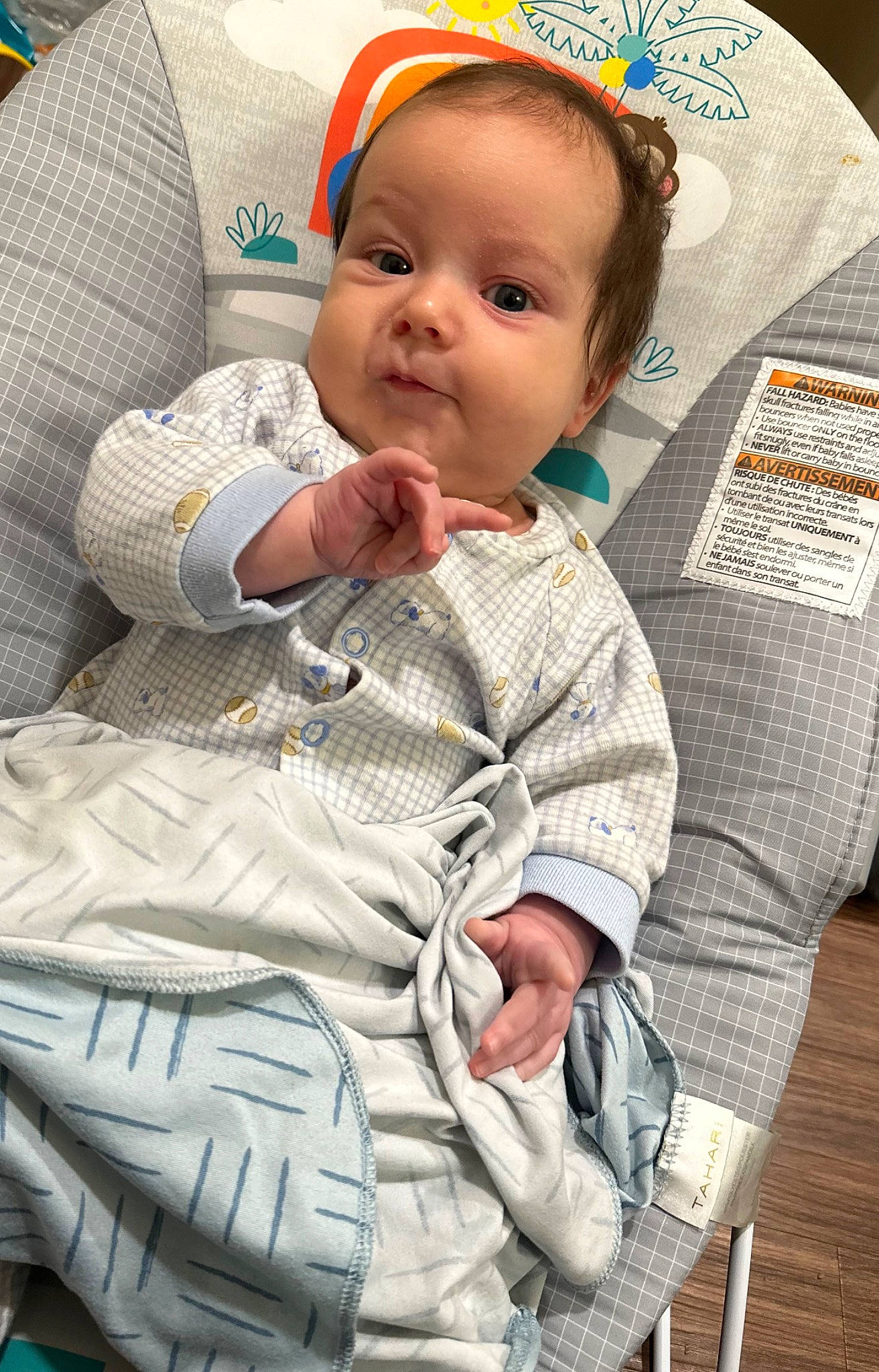 David is registered to the contest to win money with this photo: baby, baby_carriage, baby_in_car_seat, baby_products, baby_toddler_clothing, car_seat, cheek, child, comfort, face, lap, linens, pattern, person, sitting, skin, sleeve, toddler