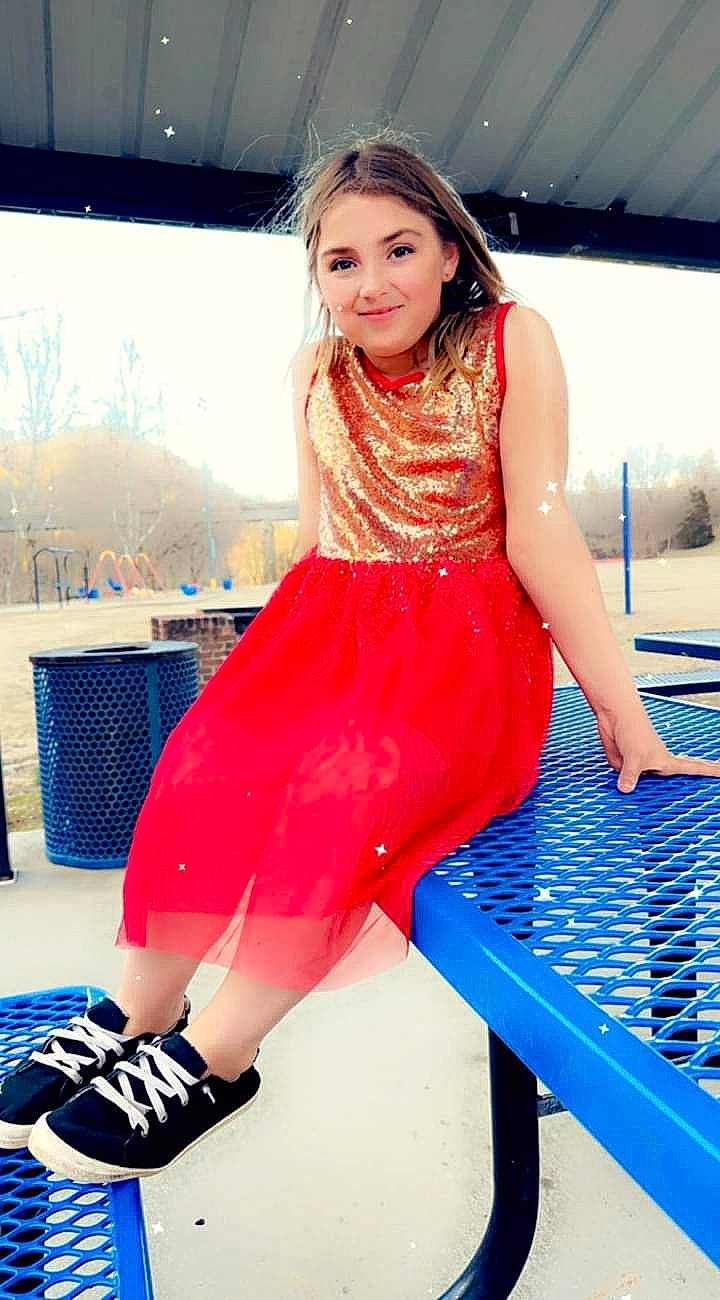 Kaelynn is registered to the contest to win money with this photo: black_hair, blue, electric_blue, fashion_design, happy, human_body, joint, joy, knee, leg, leisure, magenta, muscle, person, product, red, sandal, shoe, shoulder, standing