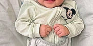 Jackson is registered to the contest to win money with this photo: baby, smiling, infant, mickey_mouse, clothing, cozy, cushion, seat, toy, colorful, happy, child, portrait, cute, indoor, babywear, face, hands, soft, fabric