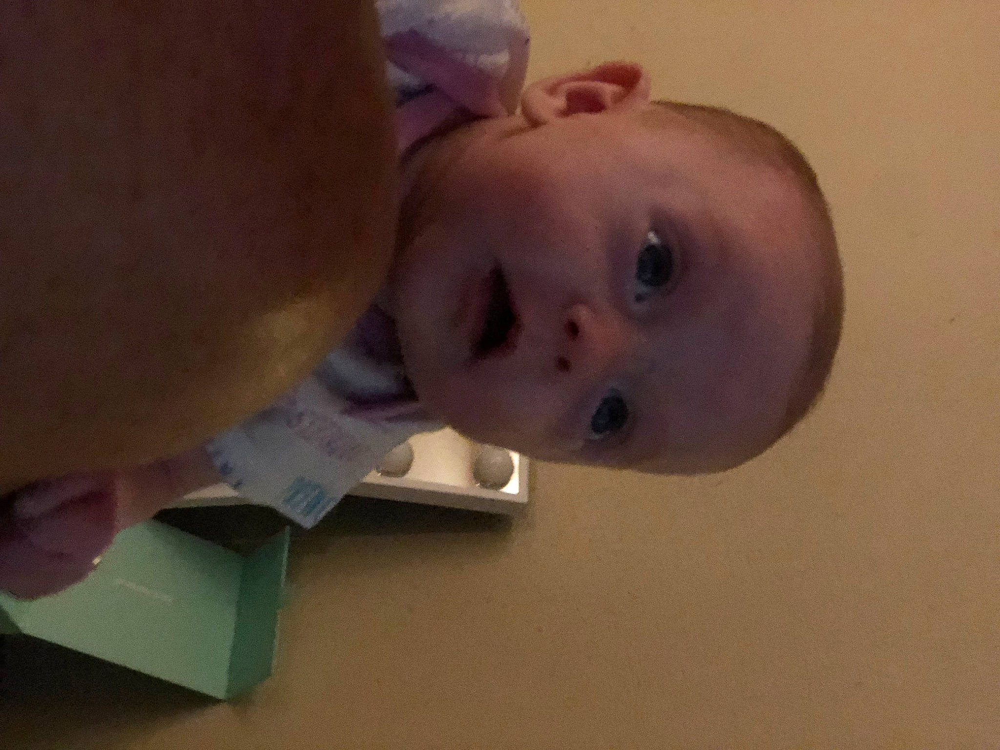 Freyja is registered to the contest to win money with this photo: baby, cheek, chest, ear, eye, eyebrow, eyelash, face, finger, forehead, hair, head, human_body, iris, lip, mouth, neck, nose, person, skin