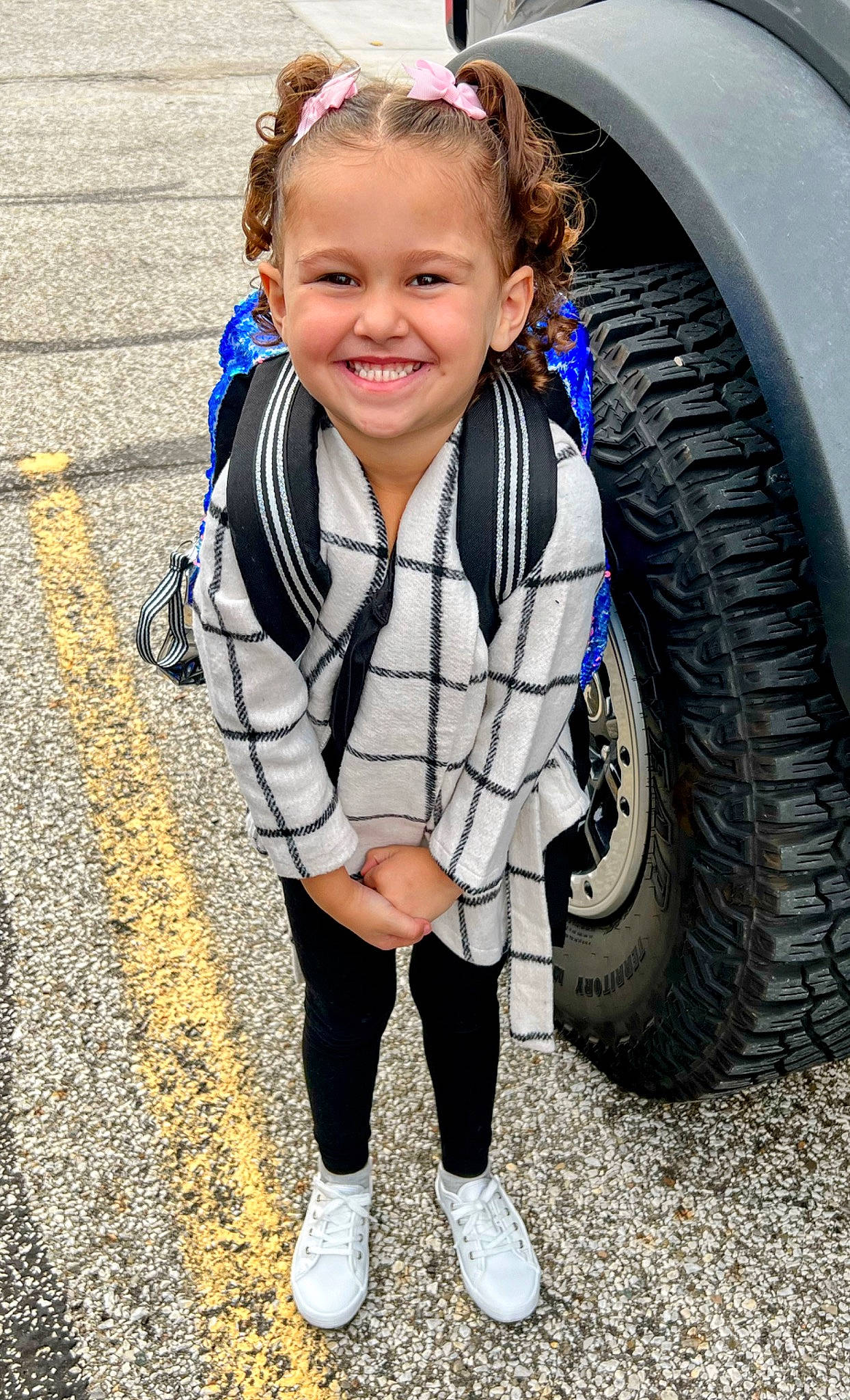 Giavonna joined the competition — help win amazing prizes! alloy_wheel, asphalt, automotive_design, automotive_exterior, automotive_tire, car, electric_blue, fender, happy, hubcap, joy, motor_vehicle, person, rim, smile, synthetic_rubber, tire, tire_care, toddler, tread