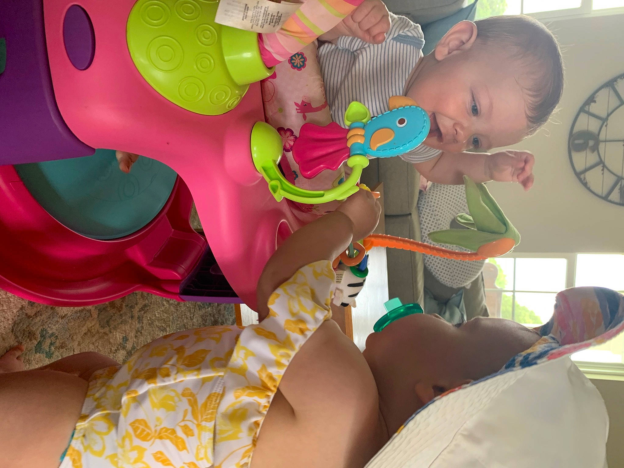 Jadon is registered to the contest to win money with this photo: art, baby, baby_products, child, clock, event, foot, fun, green, happy, human_leg, knee, leisure, organ, pattern, person, room, thigh, toddler, toy