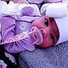 Emarelys joined the competition — help win amazing prizes! baby, pacifier, hat, white_hat, purple_clothing, daisy_embroidery, blanket, soft_texture, face, eyes, infant, cute, lying_down, indoors, closeup, headwear, child, comfort, resting, adorable