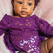 Jade joined the competition — help win amazing prizes! baby, infant, purple_lace, headband, blanket, portrait, cute, child, soft_texture, indoor, curly_hair, skin, clothing, seated, closeup, expression, photography, young_child, person, baby_girl