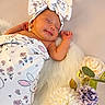 Dakota joined the competition — help win amazing prizes! newborn, baby, infant, sleeping, portrait, face, bow, headband, onesie, pajamas, floral, bunny, flowers, bouquet, blanket, faux_fur, cozy, indoors, peaceful, photography