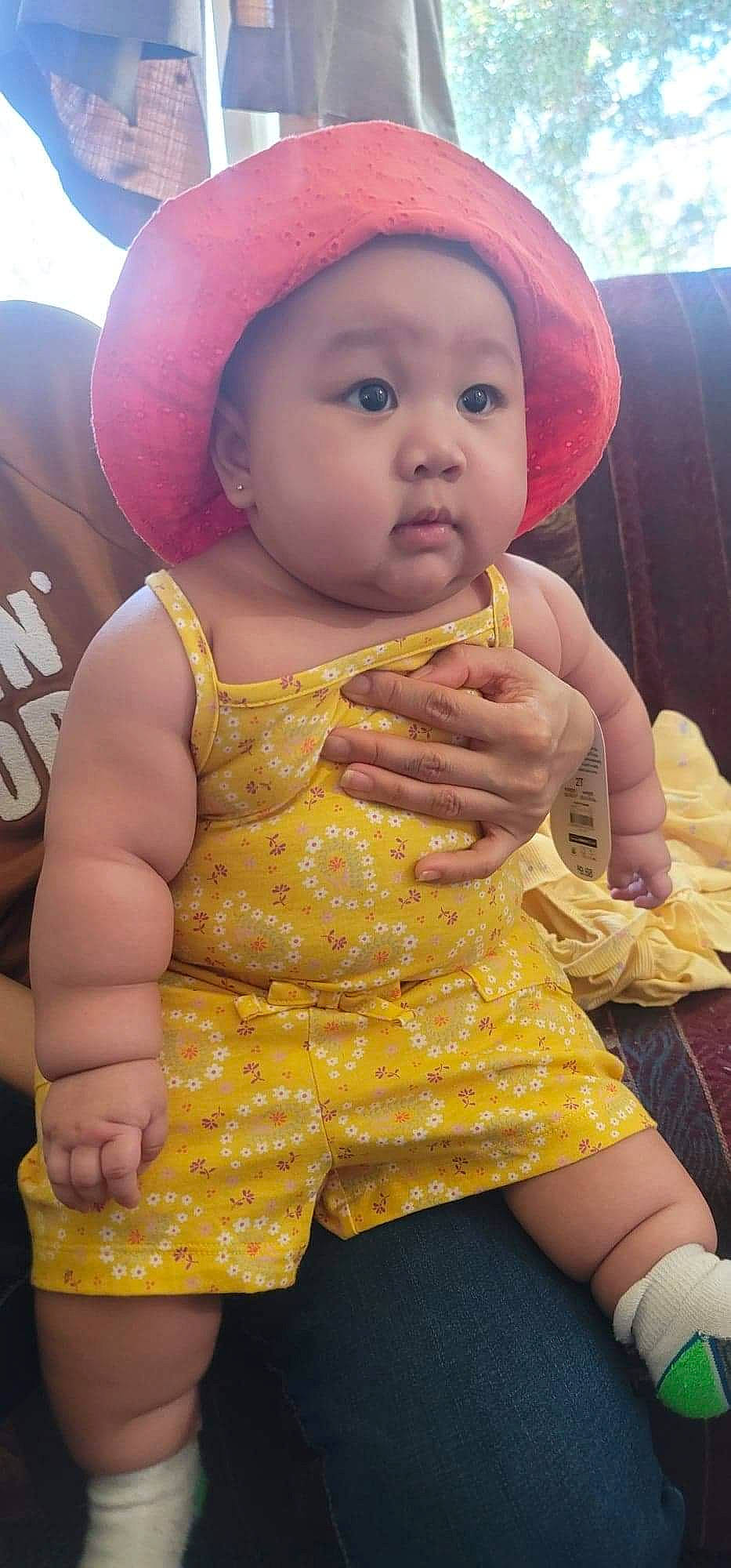 Cece joined the competition — help win amazing prizes! arm, baby_toddler_clothing, cap, cheek, chin, eye, finger, fun, happy, head, headwear, human_body, lip, mouth, nose, orange, organ, person, pink, skin