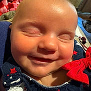 Oaklynn joined the competition — help win amazing prizes! adorable, baby, child, close_up, clothing, cute, eyes_closed, face, happy, head, infant, peaceful, portrait, red_bow, skin, sleepy, smiling, stars, toddler, young