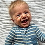Lucas joined the competition — help win amazing prizes! baby, blanket, blue_striped_clothing, cheerful, child, closeup, cute, expression, face, happy, head, indoors, infant, lying_down, person, portrait, skin, smiling, texture, young