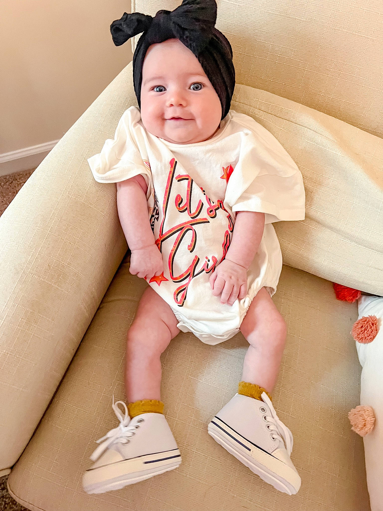 Layken joined the competition — help win amazing prizes! baby, baby_toddler_clothing, cap, child, comfort, eye, finger, happy, headwear, human_leg, joy, knee, person, pink, shoe, shorts, sleeve, smile, sneakers, sock